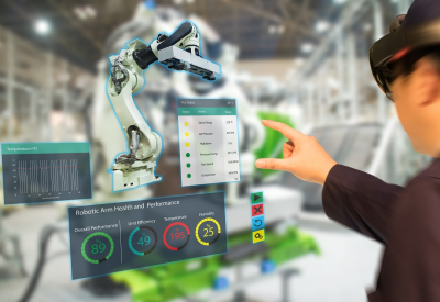 iot industry 4.0 concept, industrial engineer (blurred) using smart glasses with augmented mixed with virtual reality technology to monitoring machine in real time.Smart factory use Automation robot arm