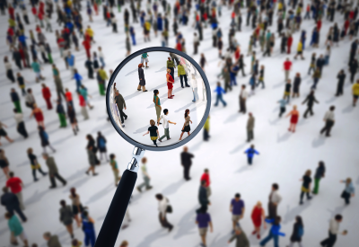 Magnifying glass on a crowd of people